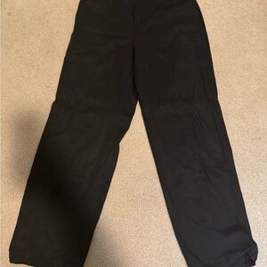 Vuori Villa Utility Trouser in black, size medium.